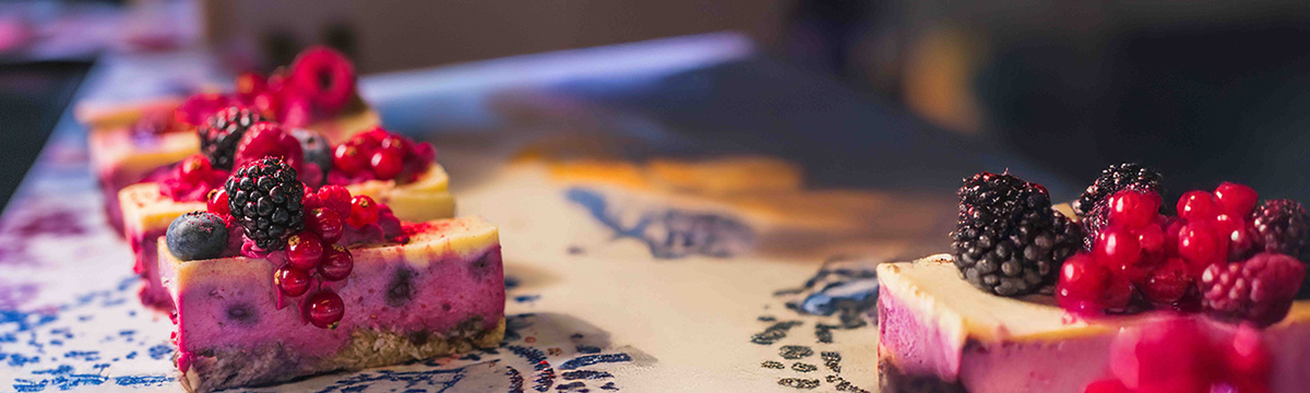 Yummy berry cake slices laying on a plate